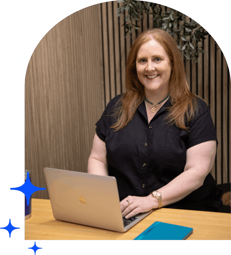 Kristyn Dunlap KayKay Consulting Group with a Laptop